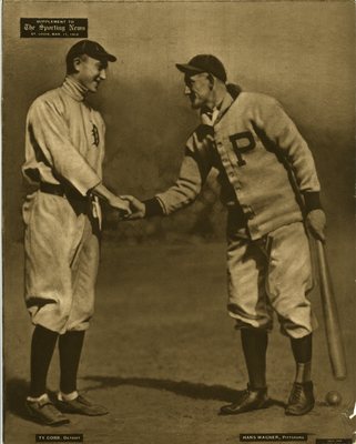 Two baseball players shaking hands